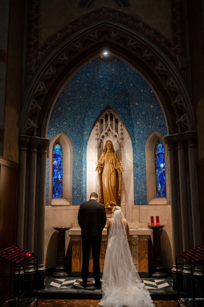 Cleveland Old Courthouse Wedding - Ceremony at Cathedral of St. John The Evangelist with bride and groom