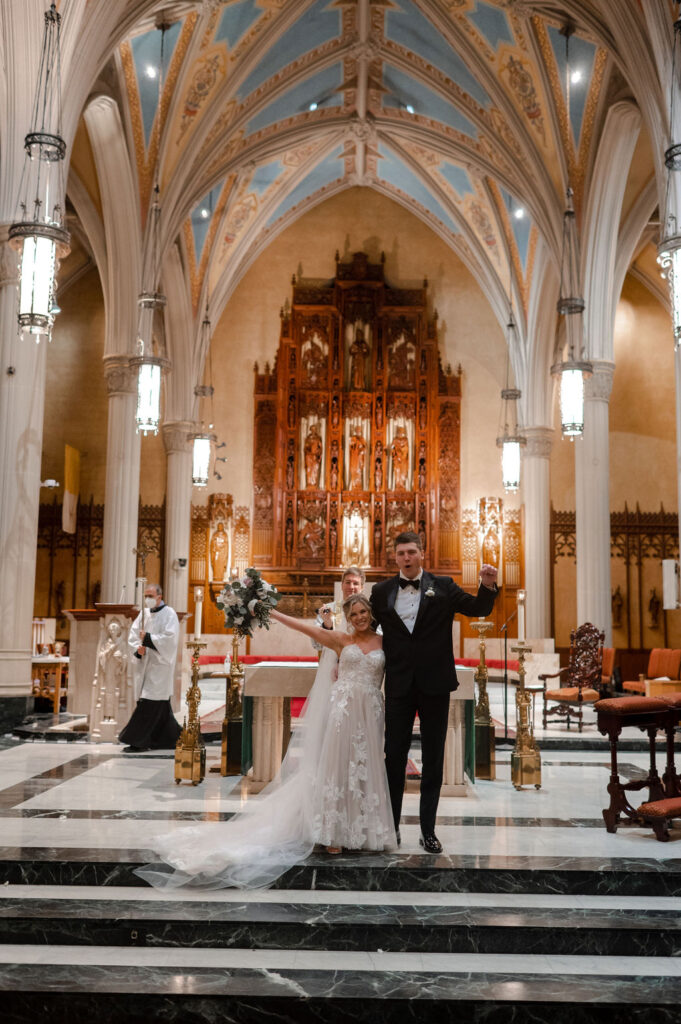 Cleveland Old Courthouse Wedding - Ceremony at Cathedral of St. John The Evangelist with bride and groom