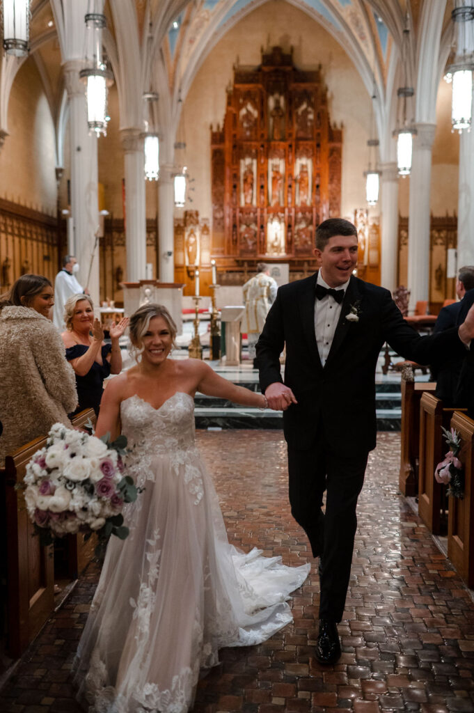 Cleveland Old Courthouse Wedding - Ceremony at Cathedral of St. John The Evangelist with bride and groom