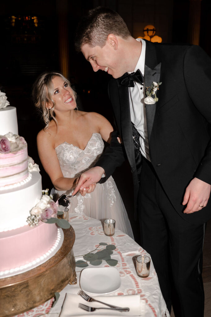 Cleveland Old Courthouse Wedding - bride and groom cake cutting